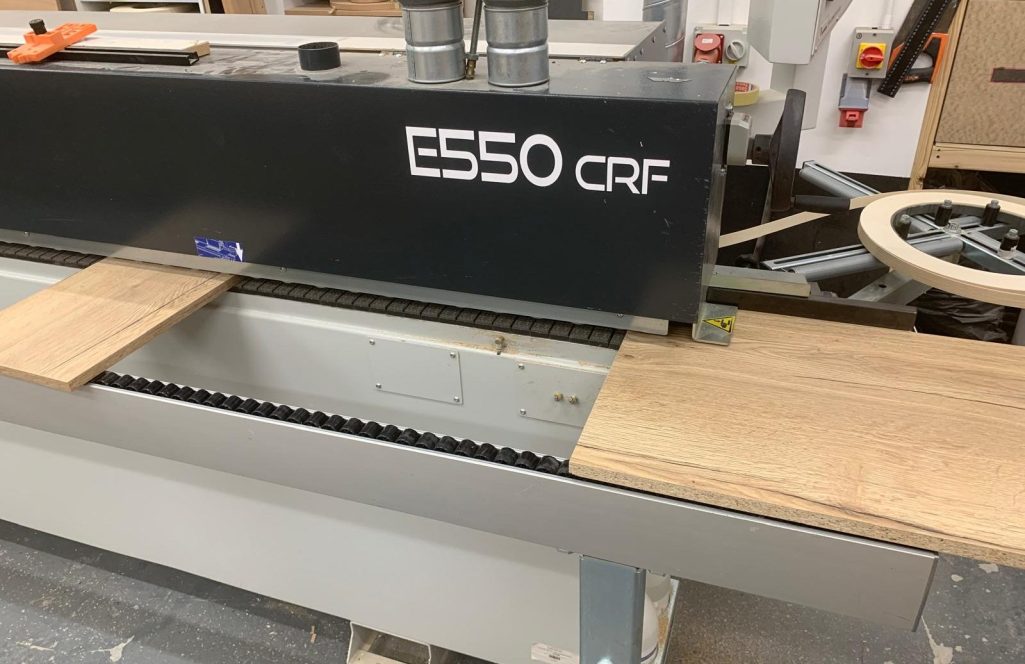 Our Edgebander making doors We use our edgebander which uses the latest technology along with abs edging to give a quality hard-waring finish